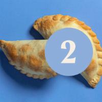 Ground Beef - 2 Empanadas · Argentina meets America with a blend of red peppers, scallions, potatoes, green olives, and ...