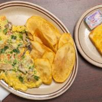 Vegetarian Omelette · Green & red peppers, onion, cilantro, tomato, mushrooms & cheese.