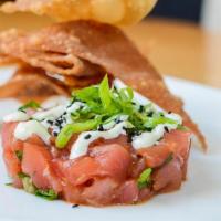 Tuna App · sushi grade tuna, tamari, green onions, ginger, wasabi aioli, capers, crispy wontons