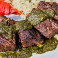 Chimichurri Short Rib · oven braised beef short rib, house chimichurri, fire-roasted red bell pepper, tomatillo rice...