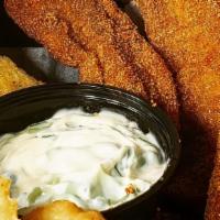 Chicken Strip Basket · Hand breaded and served with French fries. Tossed in your choice of (1) sauce, BBQ, hot, bou...