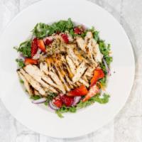 Strawberry Fields · Baby kale blond topped w/grilled chicken breast, goat choose, strawberries, candied walnuts,...