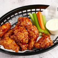 Naked Wings · Gluten free. Six piece non breaded bone in wings, served with celery, carrots and choice of ...