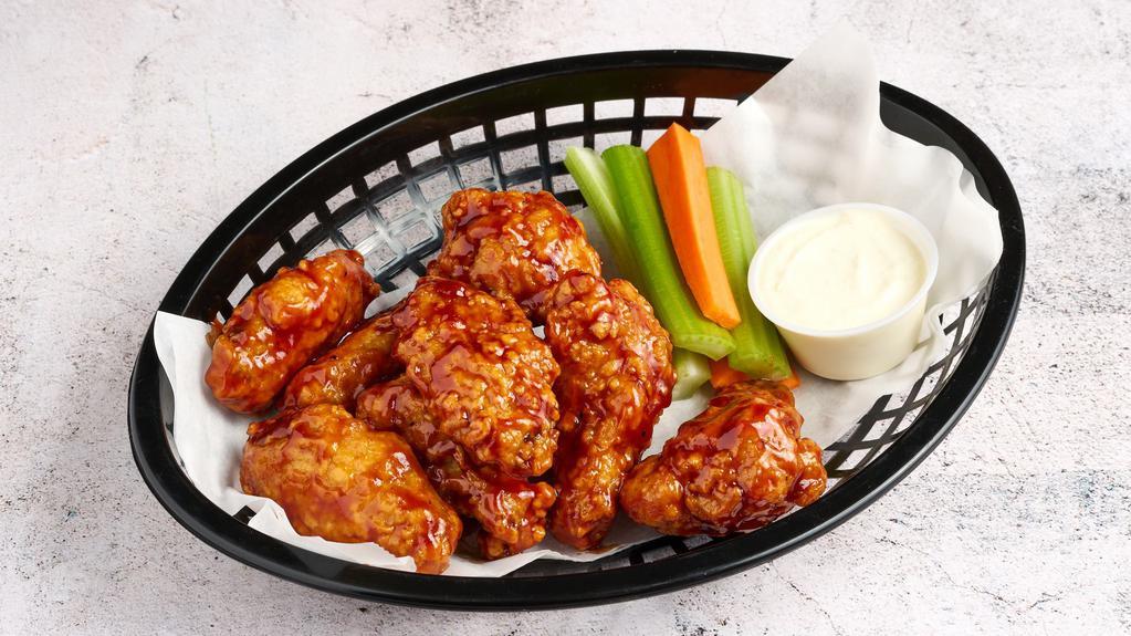 Naked Wings · Gluten free. Six piece non breaded bone in wings, served with celery, carrots and choice of ranch or bleu cheese.
