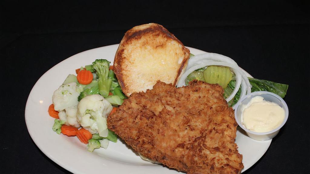 Tasty Tender Tanner-Loin · Hand breaded, tender and juicy... it’s the best in town!