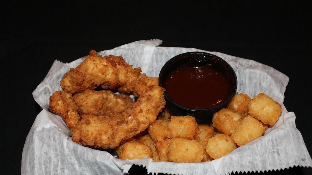 Chicken Strips · Served with tots or fries.