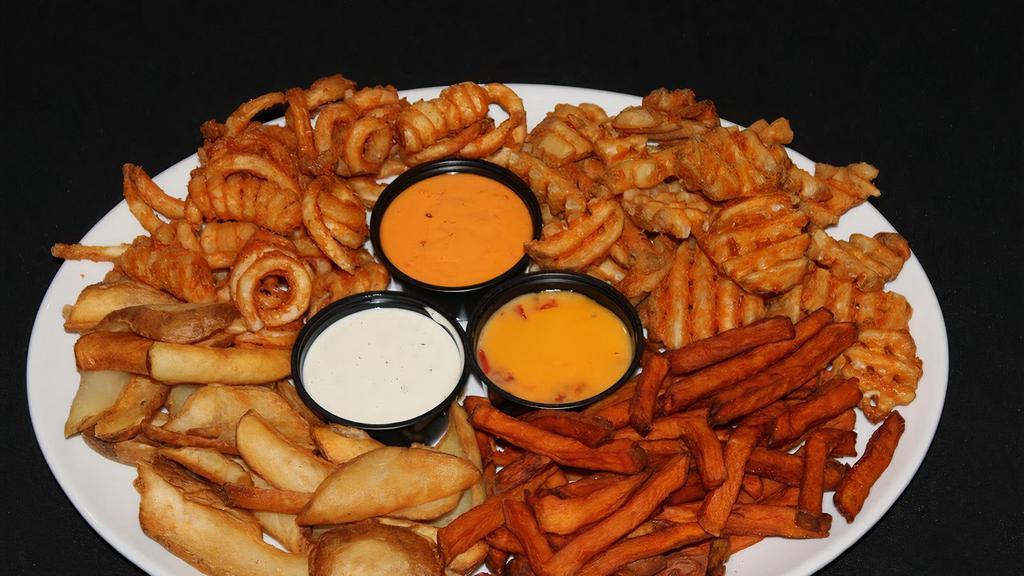 French Fry Platter · Sweet potatoes fries, scoop fries, waffle fries and Curly Q’s served with Rotel, ranch, and tangy Tanner’s dipping sauces.