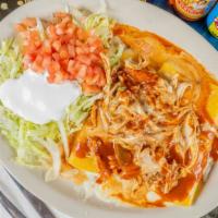 Enchiladas Rancheras · 3 cheese enchiladas topped with your choice of chicken or beef. Cooked with tomatoes, onions...
