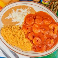 Camarones A La Diabla · Hot shrimp. We cook our shrimp with special red hot sauce, served with rice, beans, and tort...
