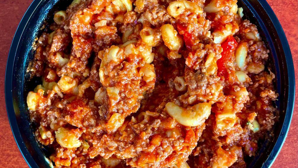 Great Goulash Mac · Classic mac and cheese mixed with ground beef, onion, pepper, and red sauce.