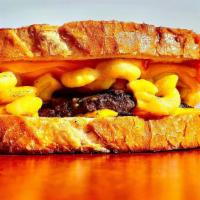 Mac Meltdown · Toasted grilled cheese meat melt with meltdown sauce and mac and cheese, your choice of chee...