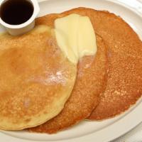 Pancakes · 7am-10am Only.  3 Pancakes served with butter and a side of syrup.