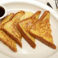 French Toast · 7am-10am Only.  Two pieces of bread dipped in egg and fried until golden brown.   Served wit...