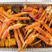 Combo 2 · Two snow crab clusters, One pound shrimp easy-peel, Half pound clams, Half pound black musse...