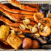 Combo 1 · One snow crab cluster, half shrimp easy-peel, One corn, One potato, a bowl of rice.