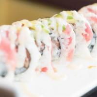 Hawaii Roll · Pineapple and smoked salmon inside, topped with tuna and avocado.  
                        ...