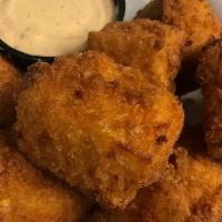 Fried Mac-N-Cheese Bites · Served with chipotles ranch dipping sauce