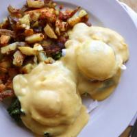 Benedict Florentine · Vegetarian. Sautéed kale, poached eggs, fried tomato, hollandaise served over english muffin
