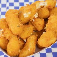 Cheese Curds · Wisconsin white cheddar curds, battered and fried