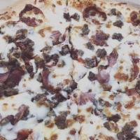 Meat Lovers Pizza · Pepperoni, ground beef, turkey ham, and sausage.