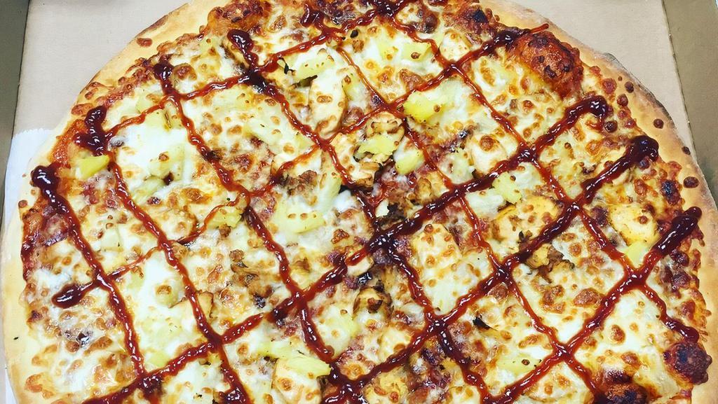 Bbq Chicken Pineapple Pizza · Grilled chicken breast, BBQ sauce and pineapple. Halal.