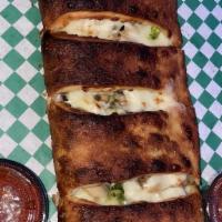 Philly Steak Stromboli · Steak, green peppers, mushrooms, and onions.
