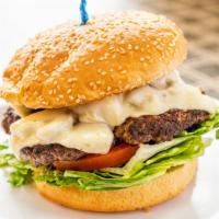 1/2 Lb. Mushroom & Swiss Burger · With lettuce, tomatoes, mayo, mushrooms, and Swiss cheese.