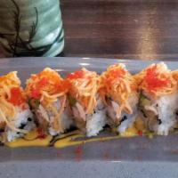 Snow White Maki (Cooked) · Shrimp tempura, avocado, and cream cheese inside, spicy crabmeat and tobiko on top.