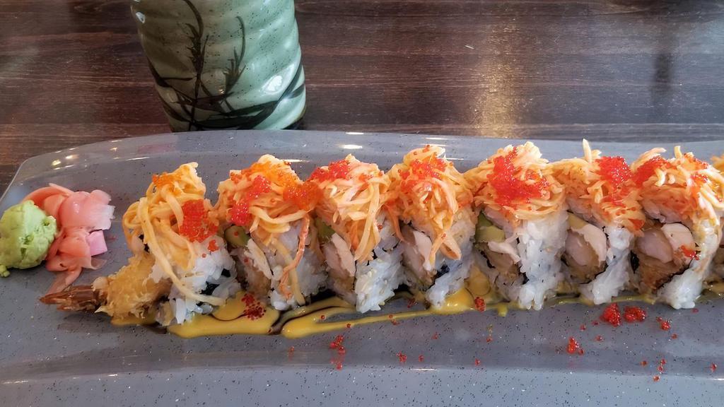 Snow White Maki (Cooked) · Shrimp tempura, avocado, and cream cheese inside, spicy crabmeat and tobiko on top.
