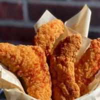 Chicken Tenders · Golden fried chicken strips with choice of BBQ,
honey mustard or house ranch