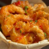 Bang Bang Shrimp Bucket · Craft beer-battered shrimp glazed in a sweet chili sauce
