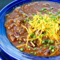 Bowl Of Pete'S Kicked Up Chili · A thick blend of fresh ground beef, green peppers, onions, tomatoes, red kidney beans and sp...