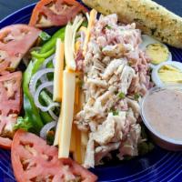 Julienne Salad · Julienne strips of turkey and Dearborn ham, Swiss and American cheeses, hard-boiled egg, tom...