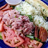 Antipasto Salad · Sliced pepperoni, shredded Dearborn ham, house cheese blend, tomatoes, red onions, kalamata ...