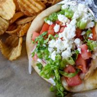 Chicken Gyro Supreme · Char-broiled chicken, feta cheese, shredded lettuce, red onions and diced tomatoes. Topped w...
