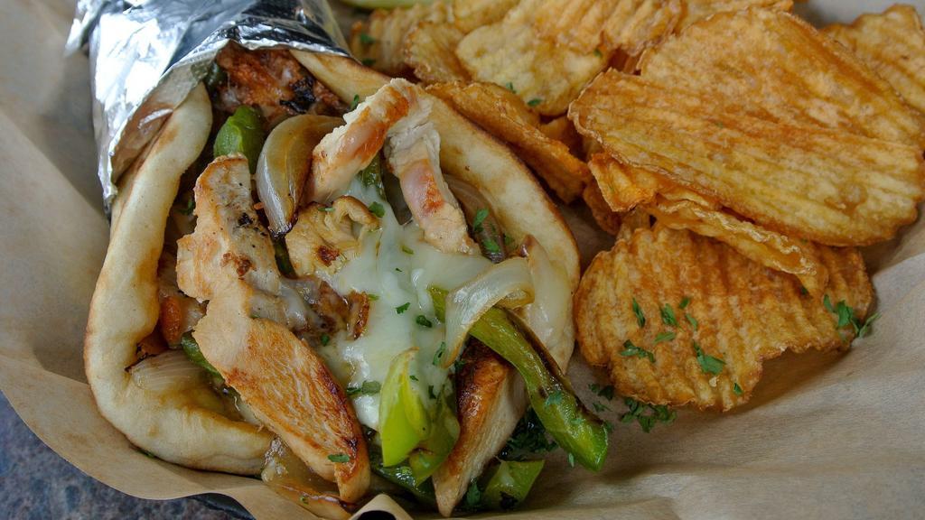 Smothered Chicken Gyro · Sliced chicken breast, mushrooms, green peppers
and onions grilled together and topped with our
house blend cheese