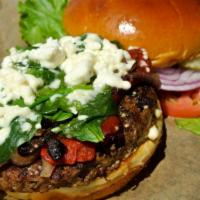 Mediterranean Burger · Grilled mushrooms, red onions, feta cheese and red peppers. Topped with fresh spinach, tomat...