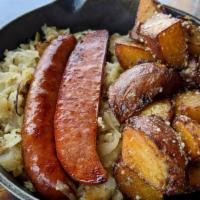 Kielbasa & Sauerkraut · A traditional recipe brought over straight from Poland! Dearborn Polish sausage pan-seared w...