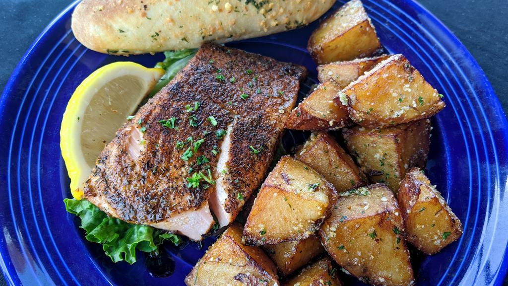 Grilled Salmon Family Meal · 4 Seasoned Grilled Salmon Filets. Choice of Potato or Wild Rice or Fresh Vegetable. Quart of Soup or Coleslaw, 4 Garlic Parmesan Breadsticks
