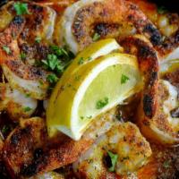 Shrimp Scampi · Lightly seasoned, sautéed jumbo shrimp in garlic butter sauce