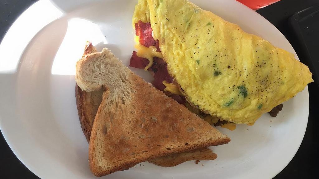 Omelets With Toast · Your choice of bell pepper, onion, mushrooms, and cheese. Add any meat for an additional charge. Consuming raw or undercooked meats, poultry, seafood, shellfish, or eggs may increase your risk of foodborne illness, especially if you have a medical condition.