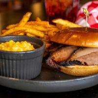 Country Boy · Sandwich piled high with choice of meat (excludes Ribs). Comes with 2 sides & drink.