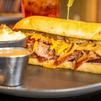Ultimate Bar-B-Q Sandwich · Everything you like all in one sandwich. Comes with 1 side & drink.