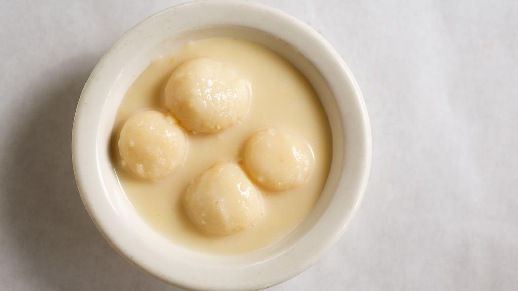 Rasmalai · Homemade cheese balls soaked in a sweet cream sauce.