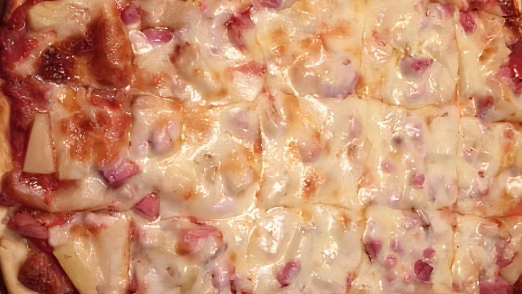 Hawaiian Thin Crust Pizza · Choice of BBQ or tomato pizza sauce. Please specify. Pineapple chunks and Canadian bacon prepared on our crispy crust with mozzarella cheese.