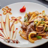 Mongolian Beef Or Chicken · Spicy. Sliced tender beef or Chicken sautéed with onion, scallions.
