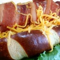 Bacon Wrapped Dog Combo With Fries & Pop · Comes with shredded cheese.