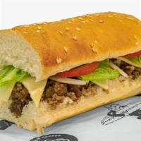 Cheeseburger Italiano · Made with fresh bread, USDA grade A meats, cheese, onions, lettuce, tomatoes, and dressing.