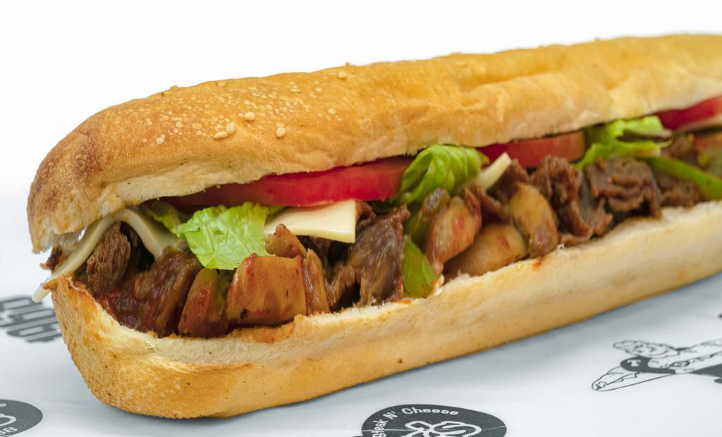 Regular Loaded Steak · Steak, cheese, pizza sauce, mushrooms, green peppers, onions, lettuce, tomatoes, tubby's famous dressing.