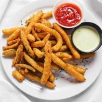 Spicy Pickle Fries · Crispy, tangy thin-cut dill pickle fries lightly coated in a premium cornmeal and spicy hors...